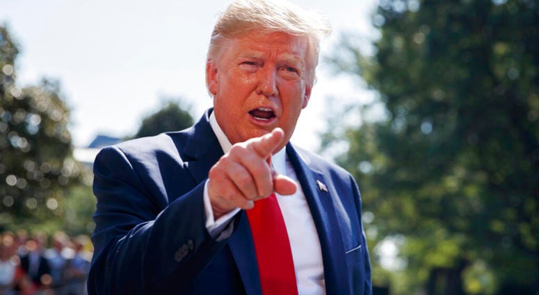 In this Aug. 9, 2019, photo, President Donald Trump talks to reporters on the South Lawn of the White House in Washington. AP DO NOT USE