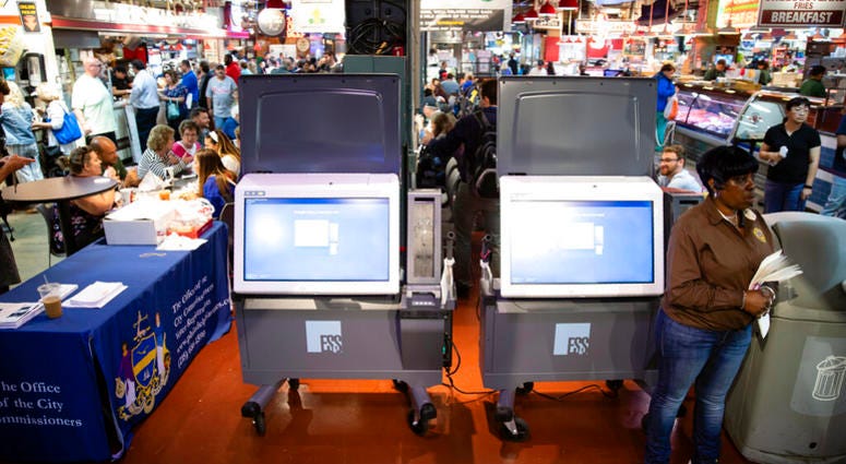In this June 13, 2019, file photo, ExpressVote XL voting machines are displayed during a demonstration at the Reading Terminal Market in Philadelphia. AP DO NOT USE