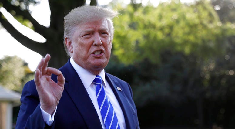 President Donald Trump talks with reporters on the South Lawn of the White House in Washington, Friday, Aug. 30, 2019, en route to Camp David in Maryland. ( President Donald Trump talks with reporters on the South Lawn of the White House in Washington, Friday, Aug. 30, 2019, en route to Camp David in Maryland. (