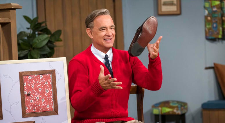 Tom Hanks as Mister Rogers in a scene from "A Beautiful Day In the Neighborhood," in theaters on Nov. 22. Tom Hanks as Mister Rogers in a scene from "A Beautiful Day In the Neighborhood," in theaters on Nov. 22.