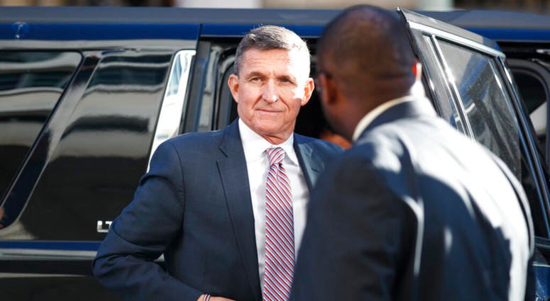 In this Dec. 18, 2018, file photo, President Donald Trump's former national security adviser Michael Flynn arrives at federal court in Washington. AP DO NOT USE