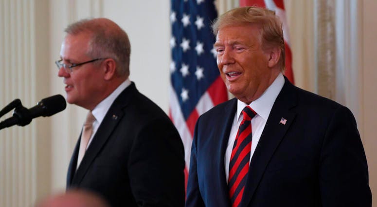 President Donald Trump and Australian Prime Minister Scott Morrison arrive for a news conference in the East Room of the White House in Washington, Friday, Sept. 20, 2019. AP DO NOT USE