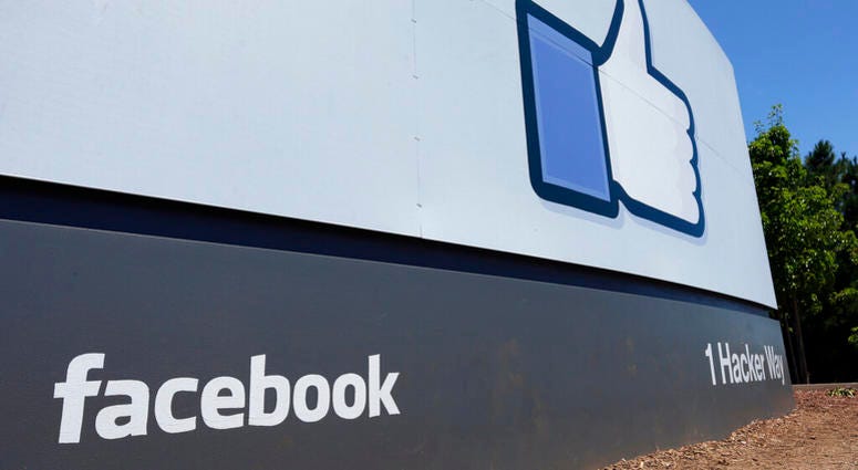 This July 16, 2013, file photo, shows a sign at Facebook headquarters in Menlo Park, Calif. AP DO NOT USE
