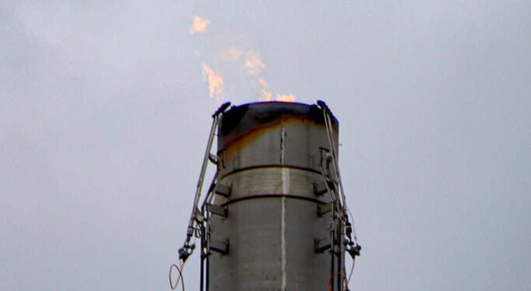 In this Oct. 17, 2019, photo, a flame burns from a stack at the MarkWest Bluestone Gas Processing Plant in Evans City, Pa. AP DO NOT USE