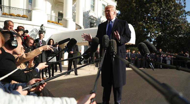President Donald Trump speaks to reporters on the South Lawn of the White House in Washington, Friday, Nov. 8, 2019, before boarding Marine One for a short trip to Andrews Air Force Base, Md. and then on to Georgia to meet with supporters.