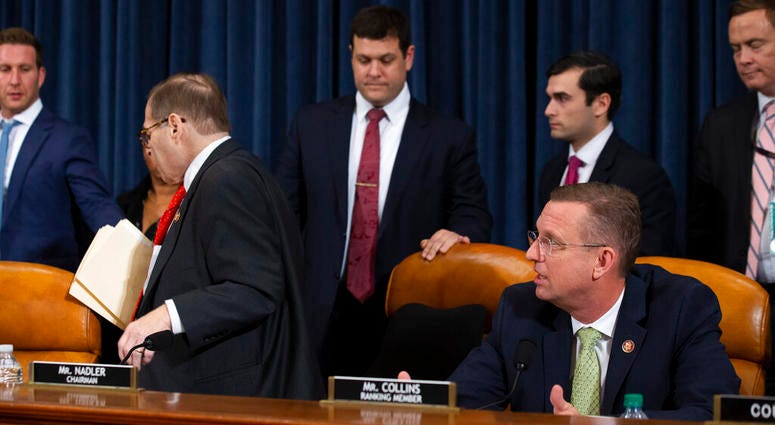 House Judiciary Committee Chairman Rep. Jerrold Nadler, D-N.Y., left, leaves as ranking member Rep. Doug Collins, R-Ga., seated right, speaks after adjournmen