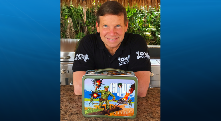 Joel Magee holding G.I. Joe Lunch Box Joel Magee holding G.I. Joe Lunch Box