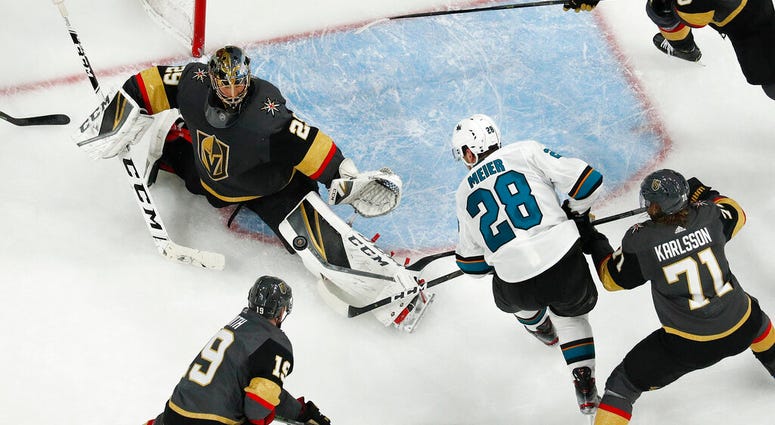 Vegas Golden Knights goaltender Marc-Andre Fleury (29) blocks a shot by San Jose Sharks right wing Timo Meier (28) during the first overtime in Game 6 of a first-round NHL hockey playoff series Sunday, April 21, 2019, in Las Vegas. AP DO NOT USE