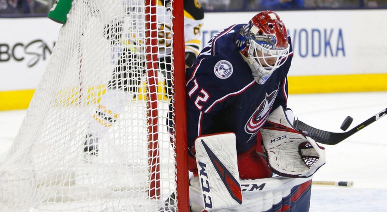 Columbus Blue Jackets' Sergei Bobrovsky, of Russia, makes a save against the Boston Bruins during the third period of Game 3 of an NHL hockey second-round playoff series Tuesday, April 30, 2019, in Columbus, Ohio. The Blue Jackets beat the Bruins 2-1.
