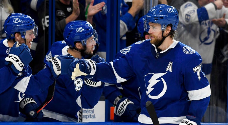 Tampa Bay Lightning defenseman Victor Hedman (77) celebrates after his goal during the third period of an NHL hockey game against the Arizona Coyotes DO NOT USE