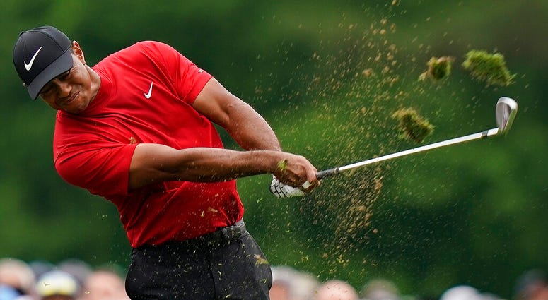 Tiger Woods hits on the 12th hole during the final round for the Masters golf tournament, Sunday, April 14, 2019, in Augusta, Ga. Tiger Woods hits on the 12th hole during the final round for the Masters golf tournament, Sunday, April 14, 2019, in Augusta, Ga.
