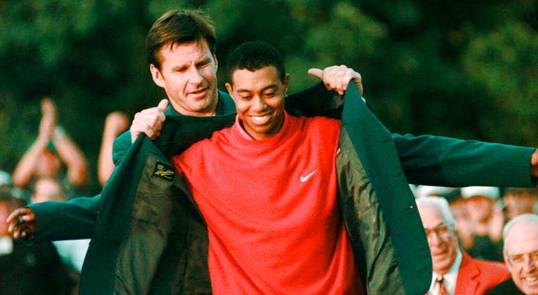 Masters champion Tiger Woods receives his Green Jacket from last year's winner Nick Faldo, rear, at the Augusta National Golf Club in Augusta, Ga. Woods completes an amazing journey by winning the 2019 Masters, overcoming 11 years of personal foibles and Masters champion Tiger Woods receives his Green Jacket from last year's winner Nick Faldo, rear, at the Augusta National Golf Club in Augusta, Ga. Woods completes an amazing journey by winning the 2019 Masters, overcoming 11 years of personal foibles and