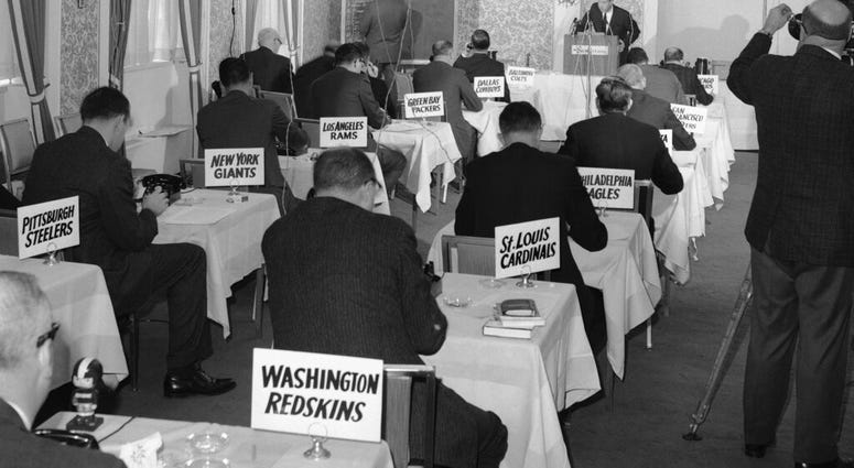 This Nov. 26, 1964, file photo shows a general view of the National Football League draft meeting in New York. This Nov. 26, 1964, file photo shows a general view of the National Football League draft meeting in New York.