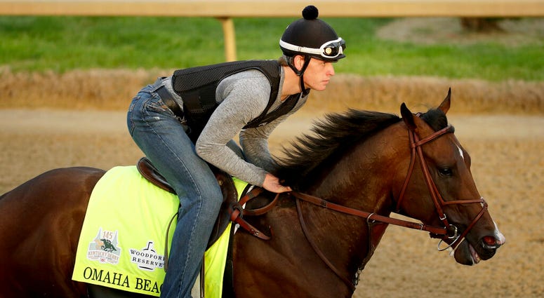 Exercise rider Taylor Cambra rides Kentucky Derby entrant Omaha Beach during a workout at Churchill Downs Wednesday, May 1, 2019, in Louisville, Ky. The 145th running of the Kentucky Derby is scheduled for Saturday, May 4. Exercise rider Taylor Cambra rides Kentucky Derby entrant Omaha Beach during a workout at Churchill Downs Wednesday, May 1, 2019, in Louisville, Ky. The 145th running of the Kentucky Derby is scheduled for Saturday, May 4.