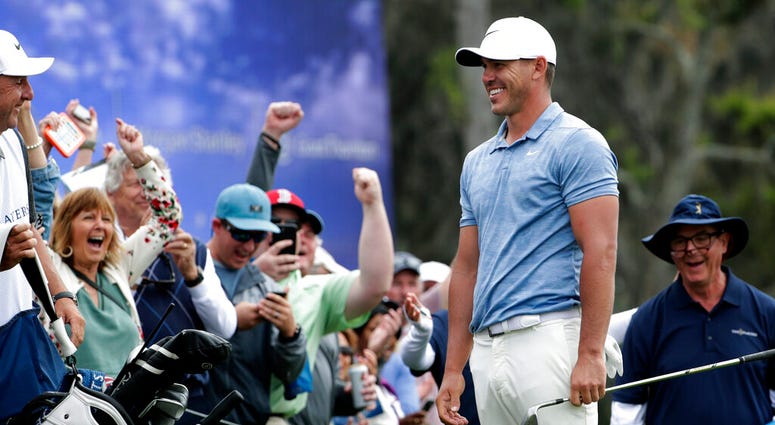 Brooks Koepka shares a laugh with the gallery after chipping onto the 18th green during the third round of The Players Championship golf tournament Saturday, March 16, 2019, in Ponte Vedra Beach, Fla Brooks Koepka shares a laugh with the gallery after chipping onto the 18th green during the third round of The Players Championship golf tournament Saturday, March 16, 2019, in Ponte Vedra Beach, Fla