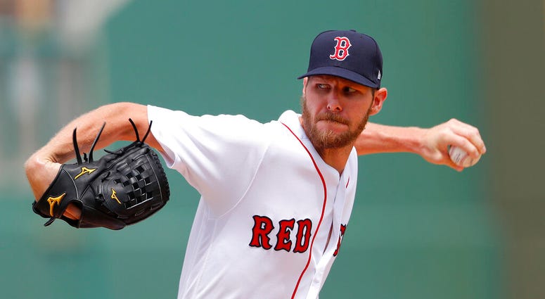 Boston Red Sox starting pitcher Chris Sale (41) works in the first inning of a spring training baseball game against the Atlanta Braves Saturday, March 16, 2019, in Fort Myers, Fla. ( Boston Red Sox starting pitcher Chris Sale (41) works in the first inning of a spring training baseball game against the Atlanta Braves Saturday, March 16, 2019, in Fort Myers, Fla. (