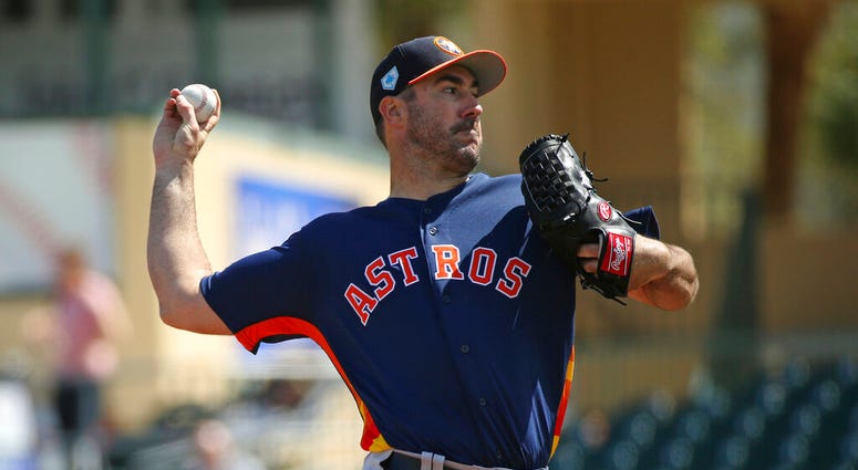 Houston Astros pitcher Justin Verlander throws during the first inning of a spring training baseball game against the Miami Marlins at the Roger Dean Chevrolet Stadium on Thursday, in Jupiter, Fla. Houston Astros pitcher Justin Verlander throws during the first inning of a spring training baseball game against the Miami Marlins at the Roger Dean Chevrolet Stadium on Thursday, in Jupiter, Fla.