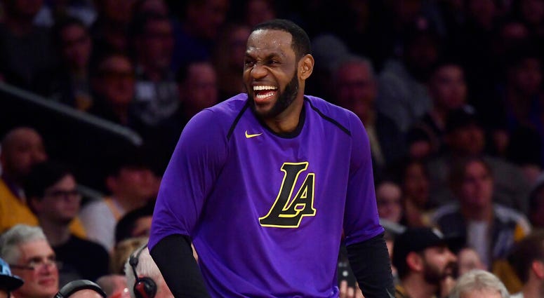 Los Angeles Lakers forward LeBron James laughs as he waits to check in to the team's NBA basketball game against the Charlotte Hornets during the second half Friday, March 29, 2019, in Los Angeles. The Lakers won 129-115. Los Angeles Lakers forward LeBron James laughs as he waits to check in to the team's NBA basketball game against the Charlotte Hornets during the second half Friday, March 29, 2019, in Los Angeles. The Lakers won 129-115.