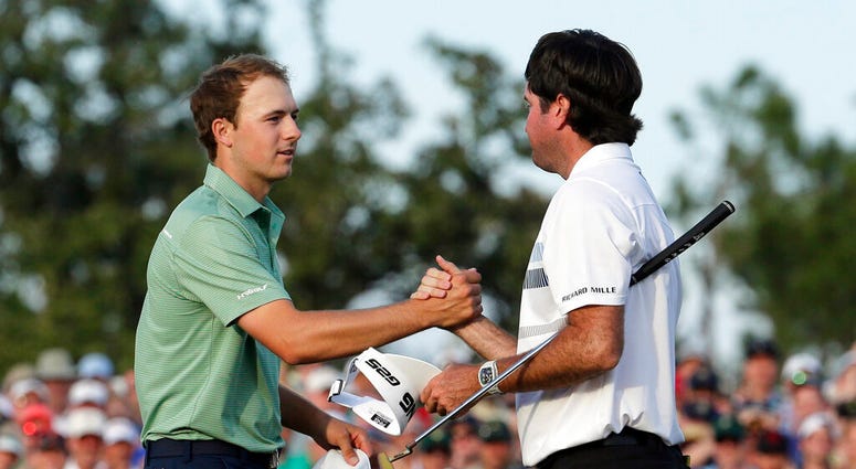 In this April 13, 2014, file photo, Bubba Watson, right, shakes hands with Jordan Spieth after winning the Masters golf tournament in Augusta, Ga. Watson won his second green jacket five years ago this week. In this April 13, 2014, file photo, Bubba Watson, right, shakes hands with Jordan Spieth after winning the Masters golf tournament in Augusta, Ga. Watson won his second green jacket five years ago this week.