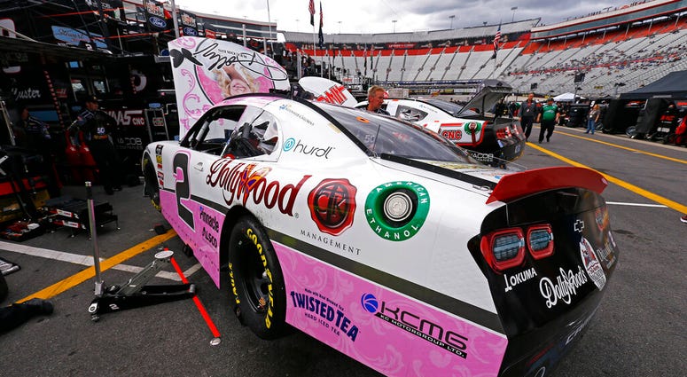 Tyler Reddick sits in the pits being worked on after practice for the NASCAR Xfinity Series auto race Friday, April 5, 2019, in Bristol, Tenn. The reigning Xfinity Series champion is piloting a Chevrolet at Bristol covered with country music icon Dolly Pa Tyler Reddick sits in the pits being worked on after practice for the NASCAR Xfinity Series auto race Friday, April 5, 2019, in Bristol, Tenn. The reigning Xfinity Series champion is piloting a Chevrolet at Bristol covered with country music icon Dolly Pa
