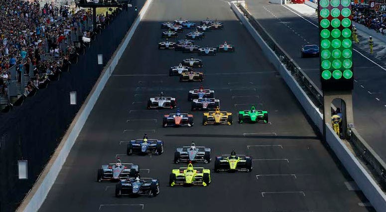 IndyCars Take The Green Flag At The Indianapolis Motor Speedway IndyCars Racing At Indianapolis Motor Speedway