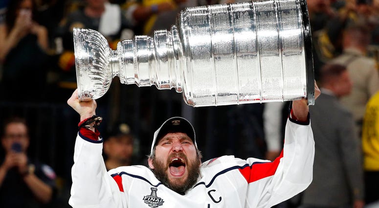 Alex Ovechkin hoists the Stanley Cup DO NOT USE