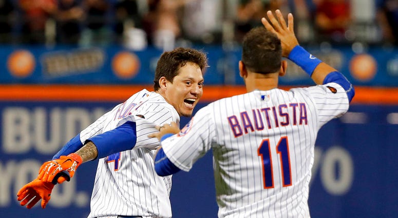 New York Mets' Wilmer Flores and Jose Bautista New York Mets' Wilmer Flores and Jose Bautista