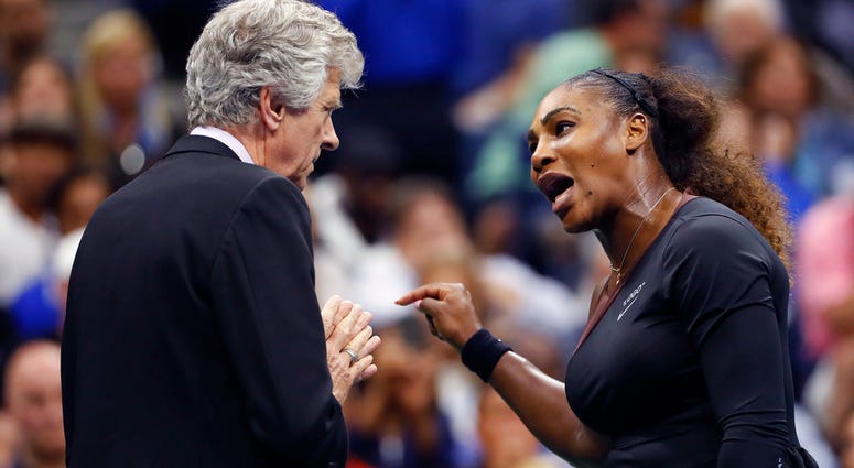 In this Saturday, Sept. 8, 2018, file photo, Serena Williams, right, talks with referee Brian Earley during the women's final of the U.S. Open tennis tournament against Naomi Osaka DO NOT USE