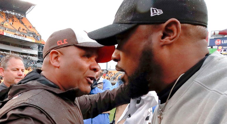Pittsburgh Steelers head coach Mike Tomlin, right, greets Cleveland Browns head coach Hue Jackson after an NFL football game against the Cleveland Browns, Sunday, Oct. 28, 2018, in Pittsburgh. The Steelers won 33-18. DO NOT USE
