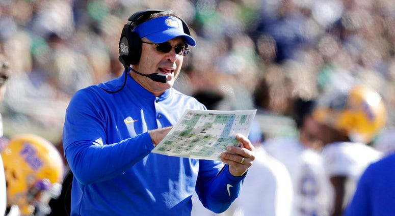ittsburgh head coach Pat Narduzzi calls a play during the first half of an NCAA college football game against Notre Dame in South Bend DO NOT USE