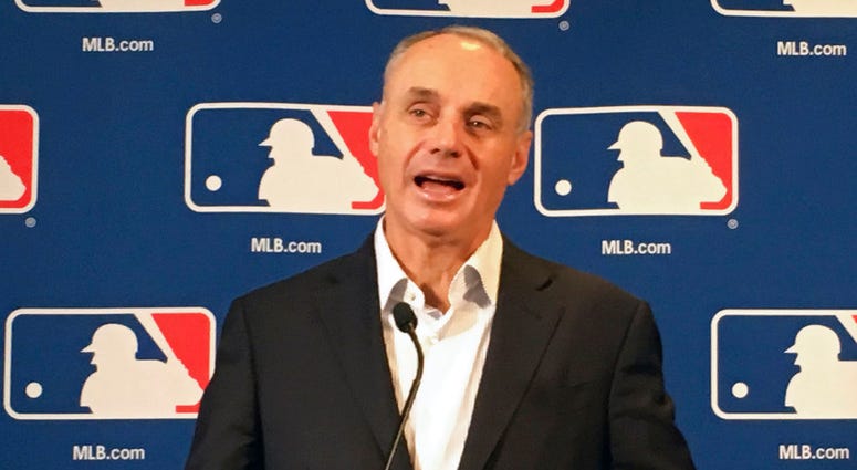 Major League Baseball commissioner Rob Manfred speaks at the baseball owners meeting in Atlanta, Thursday, Nov. 15, 2018. DO NOT USE