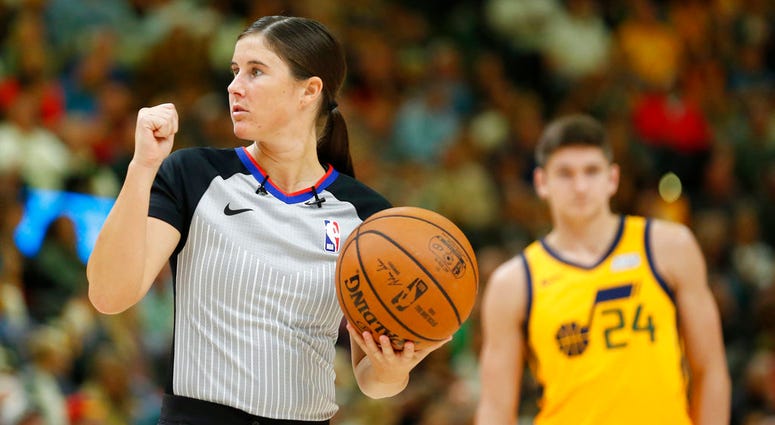 referee Natalie Sago works during the second half of an NBA basketball game referee Natalie Sago works during the second half of an NBA basketball game