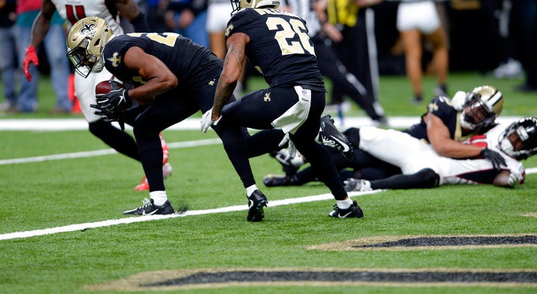 New Orleans Saints cornerback Eli Apple recovers a fumble at their goal line in the second half of an NFL football game against the Atlanta Falcons New Orleans Saints cornerback Eli Apple recovers a fumble at their goal line in the second half of an NFL football game against the Atlanta Falcons