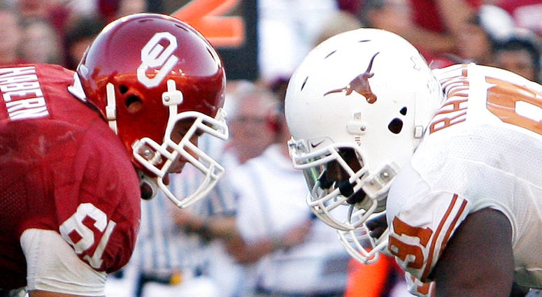 Texas defensive tackle Kheeston Randall (91) and Oklahoma offensive lineman Ben Habern (61) face off at the line of scrimmage Texas defensive tackle Kheeston Randall (91) and Oklahoma offensive lineman Ben Habern (61) face off at the line of scrimmage