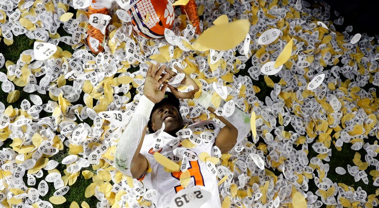 Clemson's Travis Etienne celebrates after the NCAA college football playoff championship game Clemson's Travis Etienne celebrates after the NCAA college football playoff championship game