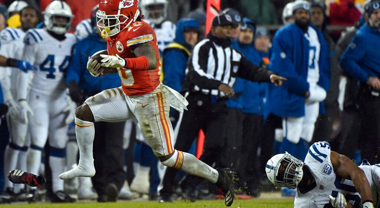 Kansas City Chiefs players celebrate after linebacker Justin Houston (50) recovered a ball fumbled by Indianapolis Colts quarterback Andrew Luck Kansas City Chiefs players celebrate after linebacker Justin Houston (50) recovered a ball fumbled by Indianapolis Colts quarterback Andrew Luck
