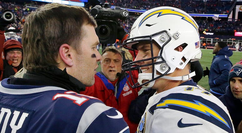 New England Patriots quarterback Tom Brady, left, and Los Angeles Chargers quarterback Philip Rivers AP DO NOT USE