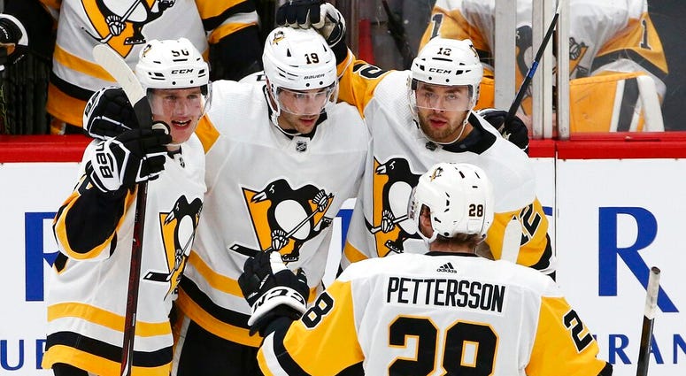 Pittsburgh Penguins defenseman Juuso Riikola (50) celebrates his goal against the Arizona Coyotes with center Derick Brassard (19), center Dominik Simon (12) and defenseman Marcus Pettersson (28) during the second period of an NHL hockey game Friday, Jan. Pittsburgh Penguins defenseman Juuso Riikola (50) celebrates his goal against the Arizona Coyotes with center Derick Brassard (19), center Dominik Simon (12) and defenseman Marcus Pettersson (28) during the second period of an NHL hockey game Friday, Jan.