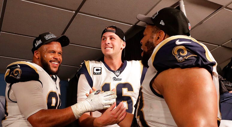 Los Angeles Rams defensive end Aaron Donald (99) Los Angeles Rams nose tackle Ndamukong Suh (93) and Los Angeles Rams quarterback Jared Goff Los Angeles Rams defensive end Aaron Donald (99) Los Angeles Rams nose tackle Ndamukong Suh (93) and Los Angeles Rams quarterback Jared Goff