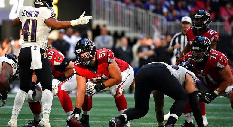 Atlanta Falcons center Alex Mack (51) prepares to work against the Baltimore Ravens during the second half of an NFL football game in Atlanta AP DO NOT USE