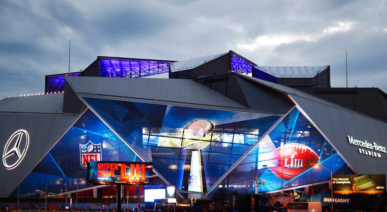 Mercedes-Benz Stadium is lit up ahead of Sunday's NFL Super Bowl 53 football game between the Los Angeles Rams and New England Patriots in Atlanta, Saturday, Feb. 2, 2019 Mercedes-Benz Stadium is lit up ahead of Sunday's NFL Super Bowl 53 football game between the Los Angeles Rams and New England Patriots in Atlanta, Saturday, Feb. 2, 2019