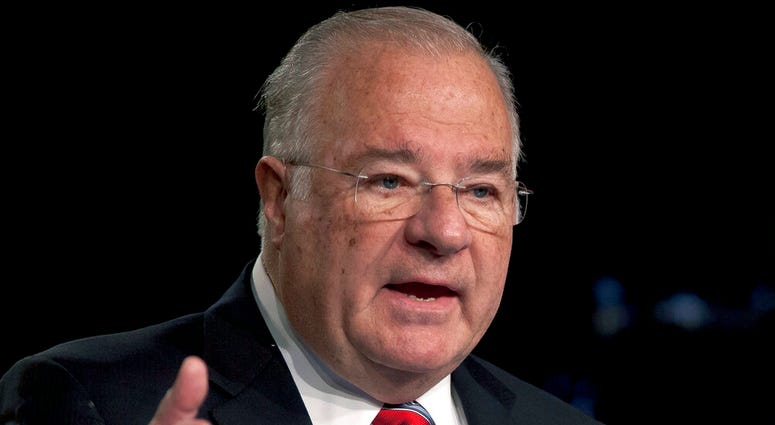 In this Feb. 14, 2012 file photo, online brokerage TD Ameritrade founder Joe Ricketts speaks during a ceremonial unveiling of his portrait which will hang in company headquarters in Omaha, Neb DO NOT USE