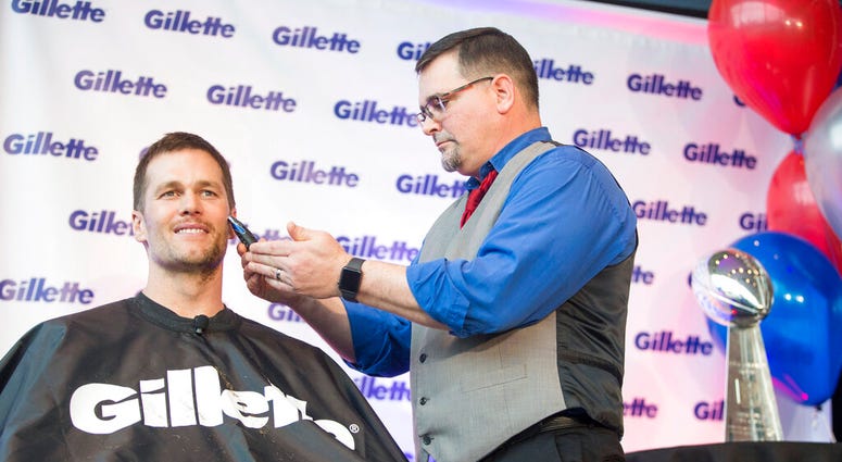 New England Patriots quarterback Tom Brady got his smoothest shave of the season, thanks to the grooming experts at Gillette AP DO NOT USE