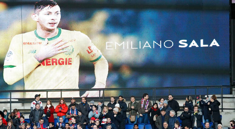 Tributes are paid to Emiliano Sala ahead of the French League One soccer match between Paris Saint-Germain and Bordeaux at the Parc des Princes stadium in Paris, Saturday, Feb. 9, 2019 Tributes are paid to Emiliano Sala ahead of the French League One soccer match between Paris Saint-Germain and Bordeaux at the Parc des Princes stadium in Paris, Saturday, Feb. 9, 2019