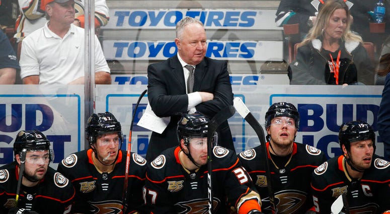 Anaheim Ducks coach Randy Carlyle, center, watches during the third period of the team's NHL hockey game against the St. Louis Blues AP DO NOT USE