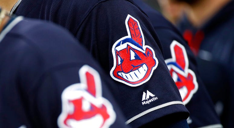 members of the Cleveland Indians wear uniforms featuring mascot Chief Wahoo members of the Cleveland Indians wear uniforms featuring mascot Chief Wahoo