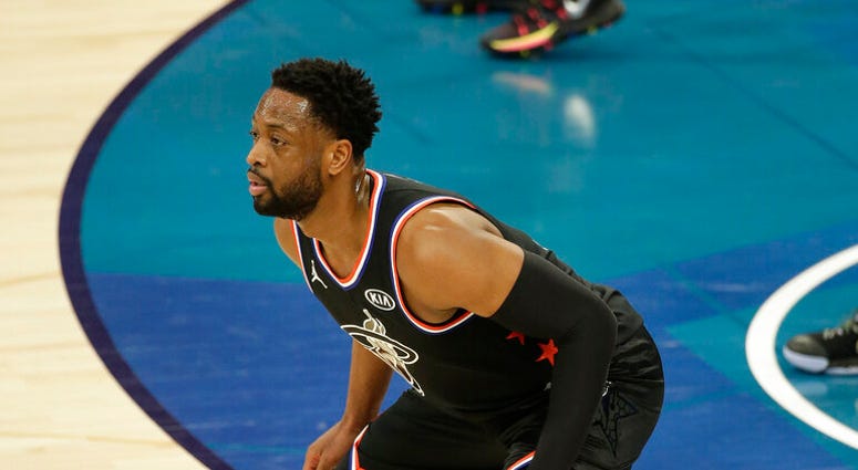 Team LeBron's Dwayne Wade, of the Miami Heat, works against Team Giannis during the second half of an NBA All-Star basketball game, Sunday, Feb. 17, 2019, in Charlotte, N.C. Team LeBron's Dwayne Wade, of the Miami Heat, works against Team Giannis during the second half of an NBA All-Star basketball game, Sunday, Feb. 17, 2019, in Charlotte, N.C.