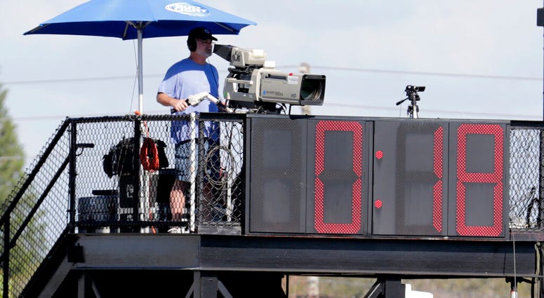 The pitch clock runs during a spring training baseball game between the Philadelphia Phillies and Pittsburgh Pirates, Saturday, Feb. 23, 2019, in Clearwater, Fla. The pitch clock runs during a spring training baseball game between the Philadelphia Phillies and Pittsburgh Pirates, Saturday, Feb. 23, 2019, in Clearwater, Fla.