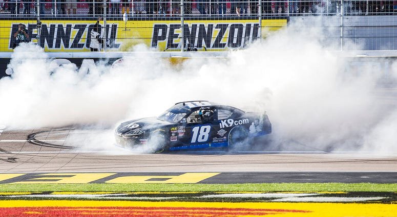 Kyle Busch celebrates with a burnout after winning the NASCAR Xfinity Series auto race Saturday, March 2, 2019, at Las Vegas Motor Speedway in Las Vegas Kyle Busch celebrates with a burnout after winning the NASCAR Xfinity Series auto race Saturday, March 2, 2019, at Las Vegas Motor Speedway in Las Vegas