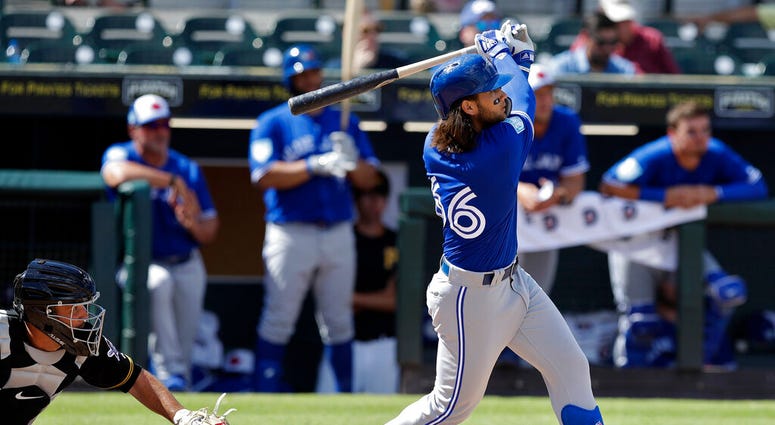 Toronto Blue Jays' Bo Bichette watches his two-run home run off Pittsburgh Pirates relief pitcher Matt Eckelman during the fourth inning of a spring training baseball game Friday AP DO NOT USE